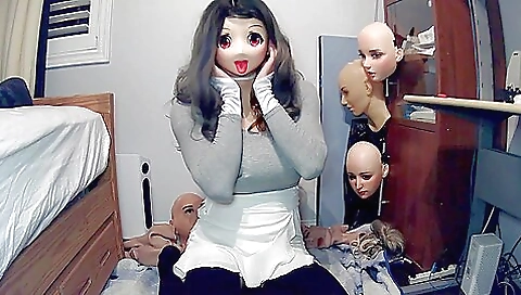 Cosplay girl with mask starts to play with her body