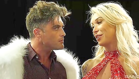 Blonde with big boobs takes the camera and sucks his throat